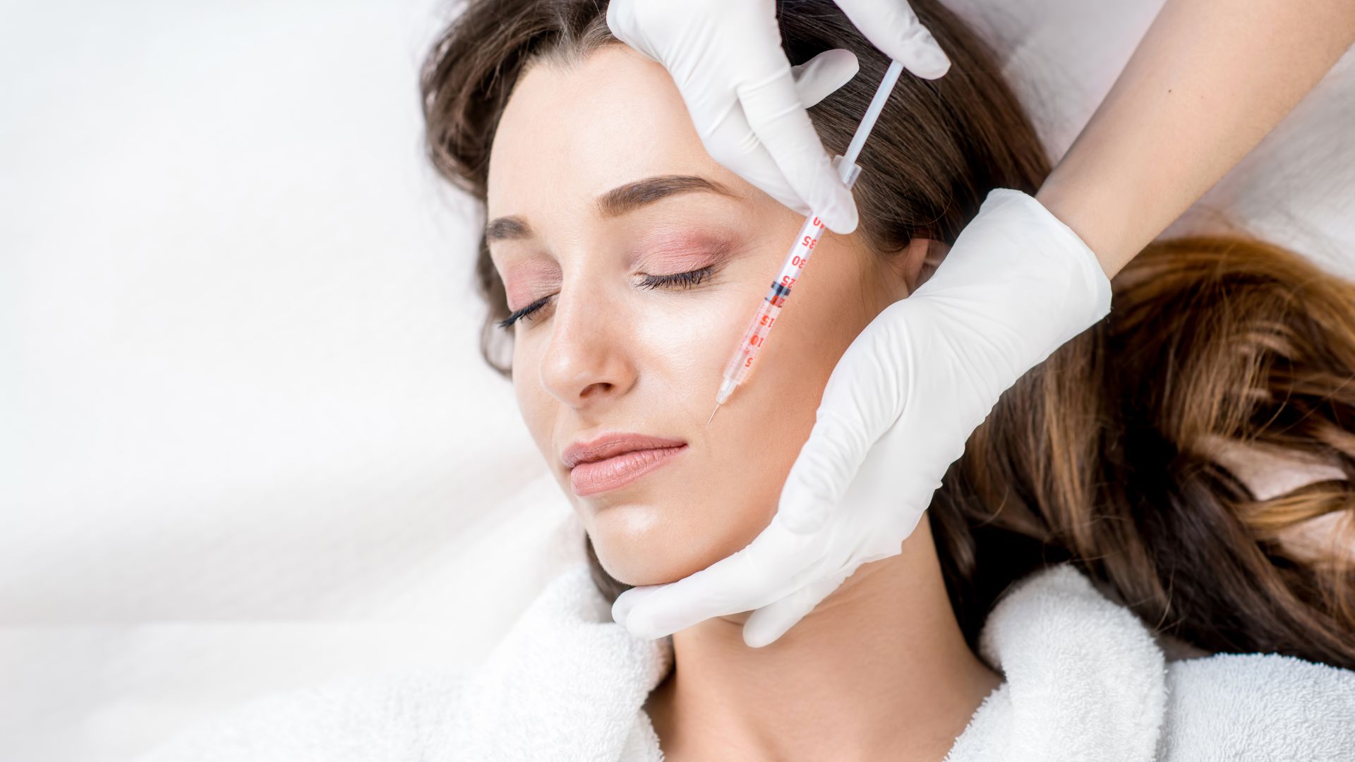 Skin Booster in Dubai - Doctor Injecting Skin Booster to Woman's Face