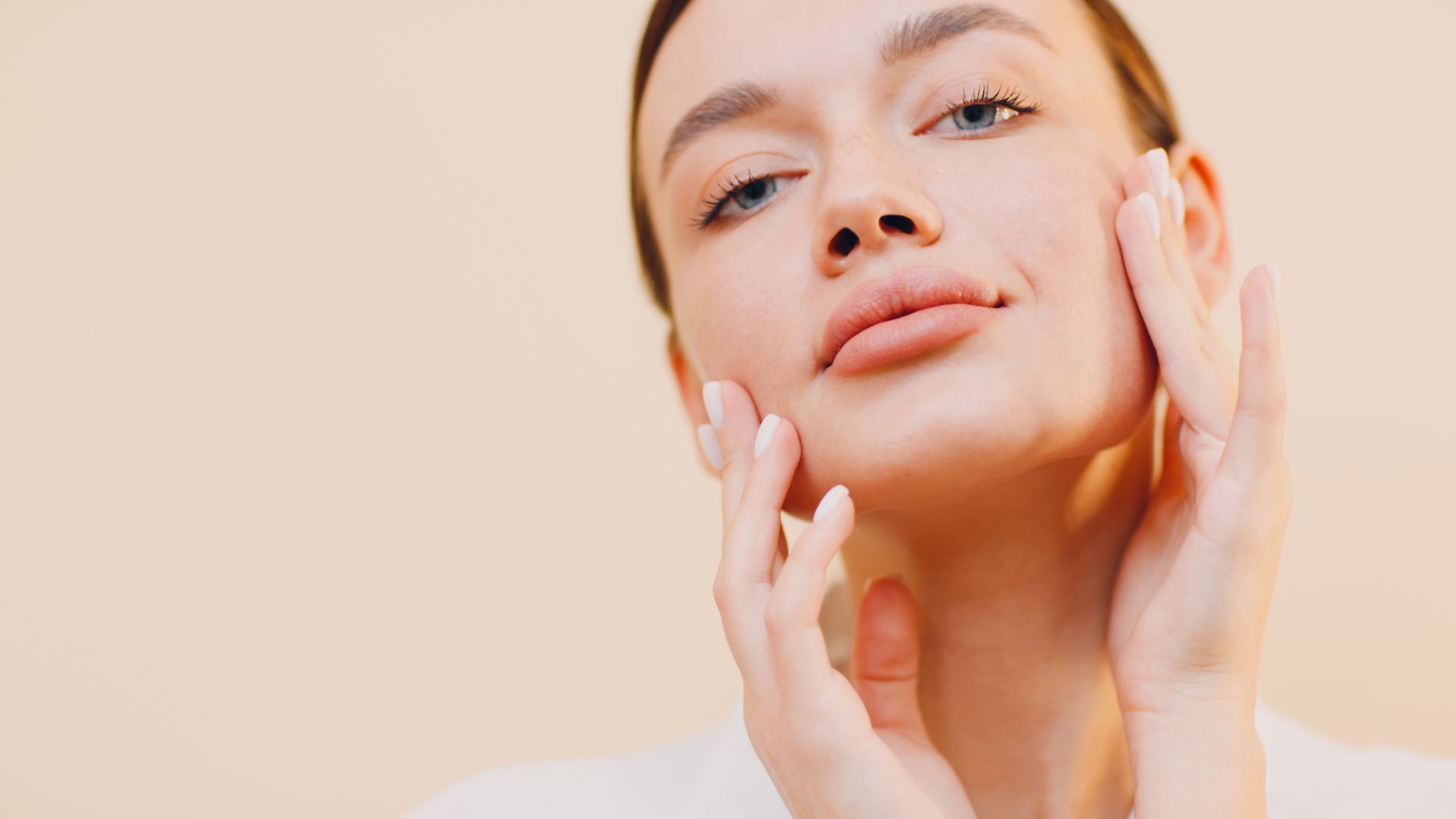 Facelift in Dubai - Woman Holding Her Face